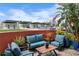 Private patio with seating area, lush landscaping, and city views at 1208 E Kennedy Blvd # 912, Tampa, FL 33602