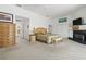 Large main bedroom with fireplace, ample closet space, and access to balcony at 833 Ponce De Leon Dr, Tierra Verde, FL 33715