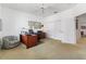 Bright home office with a desk, chair, and ample closet space at 833 Ponce De Leon Dr, Tierra Verde, FL 33715