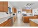 Modern kitchen boasts stainless steel appliances, granite countertops, and ample cabinetry at 833 Ponce De Leon Dr, Tierra Verde, FL 33715