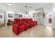 Home theater with three red recliner seats and elevator access at 833 Ponce De Leon Dr, Tierra Verde, FL 33715