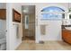 Spa-like bathroom with walk-in shower and modern vanity at 833 Ponce De Leon Dr, Tierra Verde, FL 33715