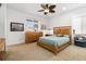 Comfortable bedroom with dresser and a ceiling fan at 833 Ponce De Leon Dr, Tierra Verde, FL 33715