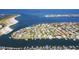 Aerial view of a coastal neighborhood with waterfront properties at 833 Ponce De Leon Dr, Tierra Verde, FL 33715