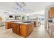 Open concept kitchen with large island and stainless steel appliances at 833 Ponce De Leon Dr, Tierra Verde, FL 33715