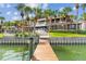 Wooden dock providing convenient waterfront access at 833 Ponce De Leon Dr, Tierra Verde, FL 33715