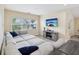 Relaxing Gathering room with sectional sofa and large windows at 9913 Alavista Dr, Gibsonton, FL 33534