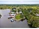 Aerial view of waterfront home and surrounding neighborhood, showing its desirable location at 9913 Alavista Dr, Gibsonton, FL 33534