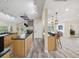 Open concept kitchen with island seating and modern finishes at 9913 Alavista Dr, Gibsonton, FL 33534