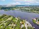 Aerial view showing home's waterfront location and surrounding landscape at 9913 Alavista Dr, Gibsonton, FL 33534