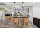 Modern kitchen with stainless steel appliances and an island at 9913 Alavista Dr, Gibsonton, FL 33534