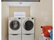Convenient laundry room with washer and dryer at 9913 Alavista Dr, Gibsonton, FL 33534