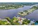 Aerial view showing home's waterfront location and surrounding area at 9913 Alavista Dr, Gibsonton, FL 33534