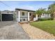 Updated home with detached garage, attractive landscaping and spacious yard at 9913 Alavista Dr, Gibsonton, FL 33534
