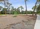 Outdoor fitness area with exercise equipment in a park setting at 9913 Alavista Dr, Gibsonton, FL 33534