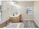 Bathroom with double vanity and soaking tub at 9913 Alavista Dr, Gibsonton, FL 33534