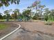 Park playground with play structures and wood-chip surface at 9913 Alavista Dr, Gibsonton, FL 33534