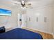 Bedroom with large closet and view into hallway at 9913 Alavista Dr, Gibsonton, FL 33534