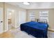 Bedroom with access to bathroom and walk-in closet at 9913 Alavista Dr, Gibsonton, FL 33534