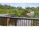 Deck overlooks peaceful waterway and lush greenery at 9913 Alavista Dr, Gibsonton, FL 33534