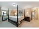 Spacious main bedroom with a large bed, and plenty of natural light at 1506 S Sheridan Forest Dr, Tampa, FL 33629