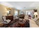 Living room with comfortable seating and antique furniture at 1506 S Sheridan Forest Dr, Tampa, FL 33629