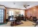 Bright home office features built-in shelving and window seating at 1506 S Sheridan Forest Dr, Tampa, FL 33629