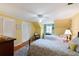 Guest bedroom with twin beds and built-in shelving at 1506 S Sheridan Forest Dr, Tampa, FL 33629