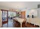 Bright dining area with French doors leading to the backyard at 1506 S Sheridan Forest Dr, Tampa, FL 33629
