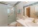 Clean bathroom with shower, toilet and sink at 1506 S Sheridan Forest Dr, Tampa, FL 33629
