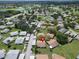 Aerial view of home and surrounding neighborhood at 401 Dorchester Pl # 58, Sun City Center, FL 33573
