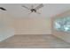Bright living room featuring laminate wood floors at 401 Dorchester Pl # 58, Sun City Center, FL 33573