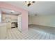 Kitchen with white cabinets and stainless steel appliances at 401 Dorchester Pl # 58, Sun City Center, FL 33573