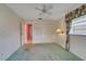 Bedroom with carpet, window, and ample closet space at 401 Dorchester Pl # 58, Sun City Center, FL 33573