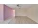 Living room with light walls and laminate floors at 401 Dorchester Pl # 58, Sun City Center, FL 33573