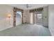 Bedroom with carpeting, ceiling fan, and sliding glass doors at 401 Dorchester Pl # 58, Sun City Center, FL 33573