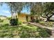 House exterior showcasing landscaping and walkway at 401 Dorchester Pl # 58, Sun City Center, FL 33573