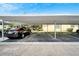 Covered carport parking spaces for residents at 401 Dorchester Pl # 58, Sun City Center, FL 33573