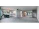 Dining room with a view and mirrored wall at 1655 S Highland Ave # J390, Clearwater, FL 33756