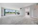 Spacious living room with large windows and view at 1655 S Highland Ave # J390, Clearwater, FL 33756