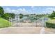 Private dock with steps leading to the lake at 1655 S Highland Ave # J390, Clearwater, FL 33756