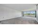 Bright living room featuring ample natural light at 1655 S Highland Ave # J390, Clearwater, FL 33756