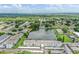 Aerial view showcasing building and lakefront location at 1655 S Highland Ave # J390, Clearwater, FL 33756