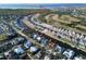 Aerial view of waterfront homes along canals leading to Tampa Bay. Address noted is 617 Islebay Dr at 617 Islebay Dr, Apollo Beach, FL 33572