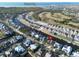Waterfront community aerial view showcases home's prime location near Tampa Bay with canal access and beautiful surroundings at 617 Islebay Dr, Apollo Beach, FL 33572