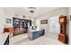 Well-lit office space with built-in bookshelves, a desk, and large windows at 617 Islebay Dr, Apollo Beach, FL 33572