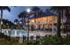 Community pool surrounded by lush landscaping and lounge chairs, creating a resort-like atmosphere at 617 Islebay Dr, Apollo Beach, FL 33572