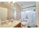 Clean bathroom with Parisian-themed shower curtain and modern vanity at 13951 Caden Glen Dr, Hudson, FL 34669