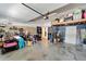 Attached garage with overhead storage and ample space for parking and storage at 13951 Caden Glen Dr, Hudson, FL 34669