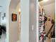 Walk-in closet with shelving for storage in the hallway at 13951 Caden Glen Dr, Hudson, FL 34669